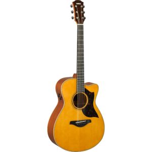 Acoustic guitar with a natural wood finish and a cutaway body; Yamaha headstock, tortoiseshell pickguard, and six strings.